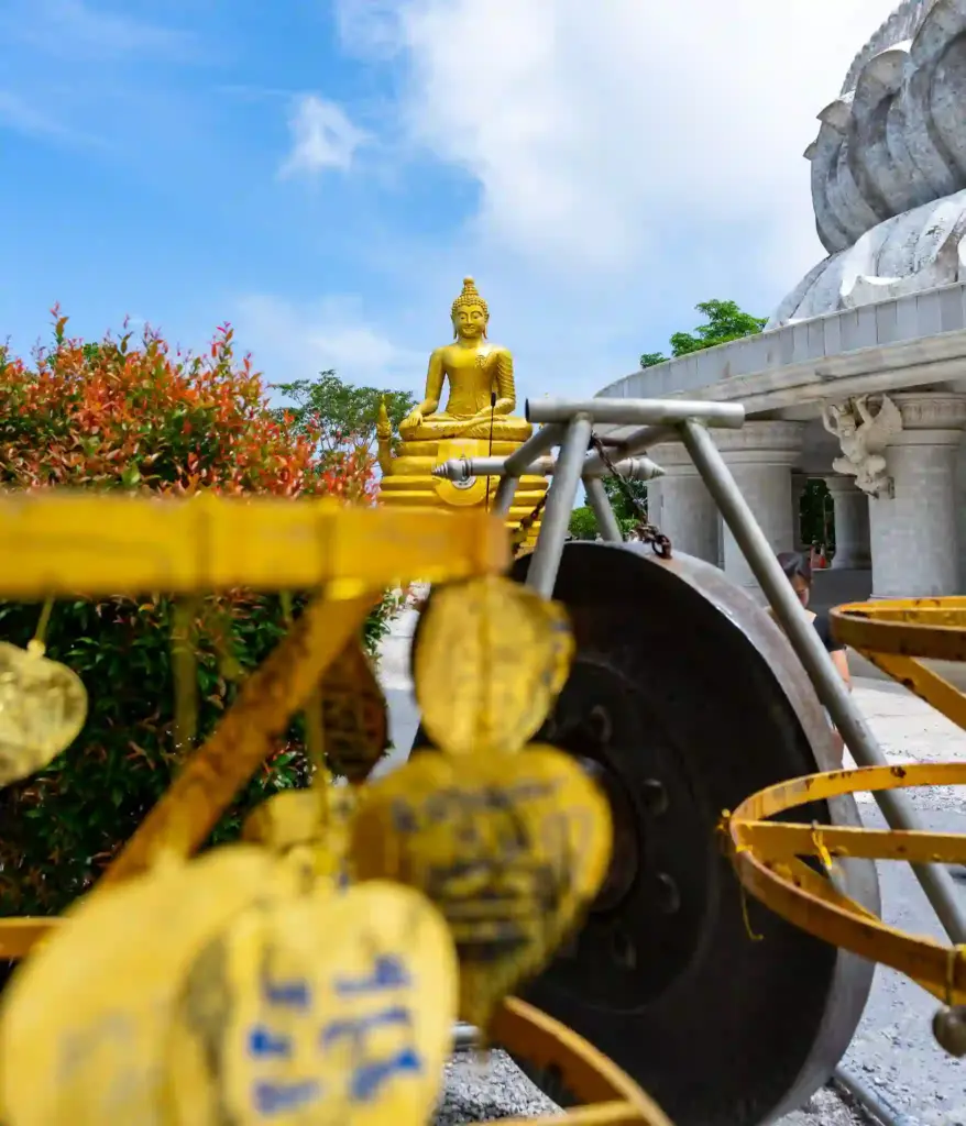 Glided golden leaves hang from strings at the Bid Buddha in Phuket. Photo: Harmeet Sehgal