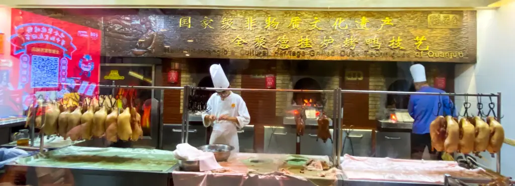 Traditional style of cooking Peking Duck in woodfired ovens. Photo: Harmeet Sehgal